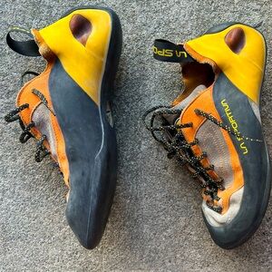 Men’s Sportiva climbing shoes size 10.5 and Sierra corduroy chalk bag.